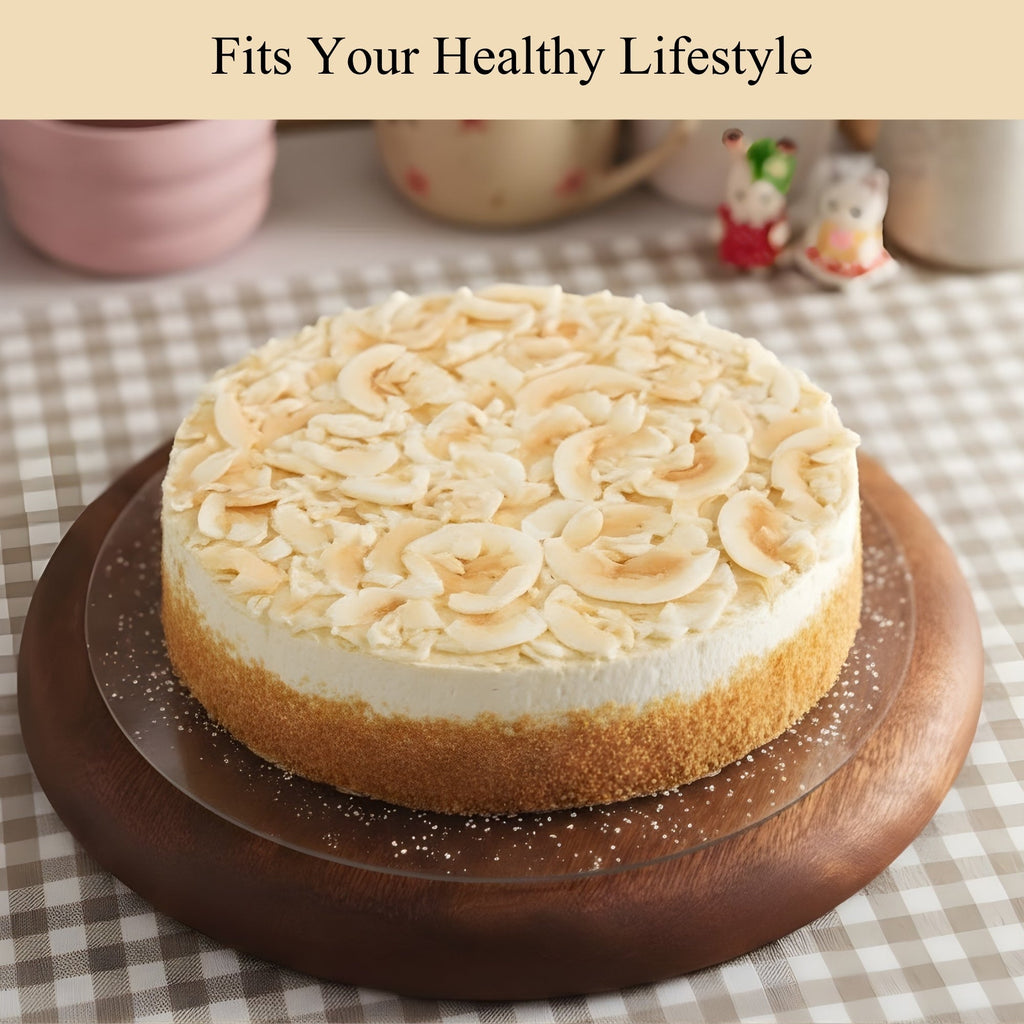 Cheesecake with a textured top on a wooden board, placed on a checkered tablecloth.