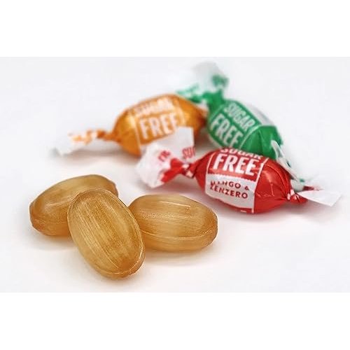 Three round brown candies with four wrapped candies labeled 'Free' on a white background.