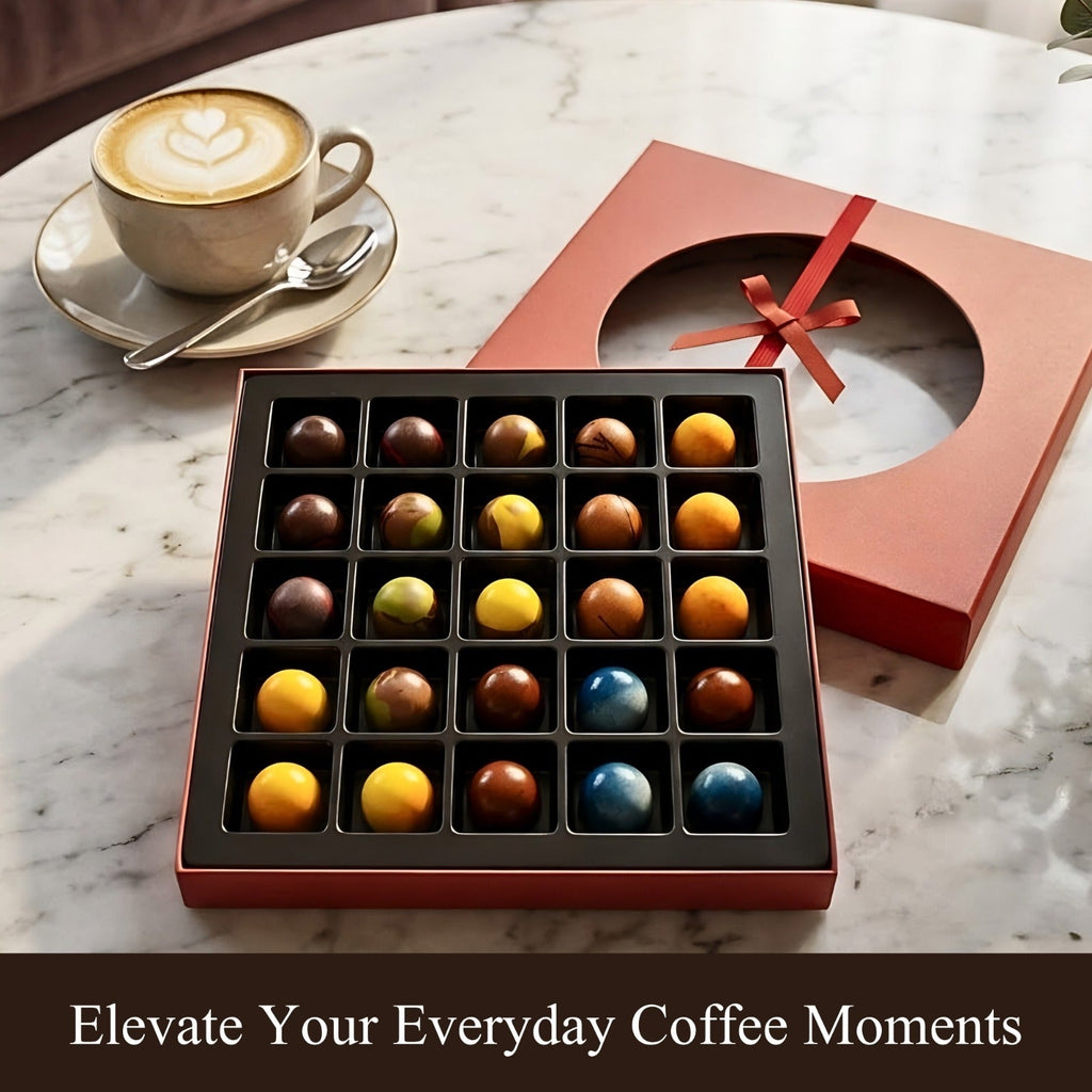 Box of chocolates with a cup of coffee on a marble surface