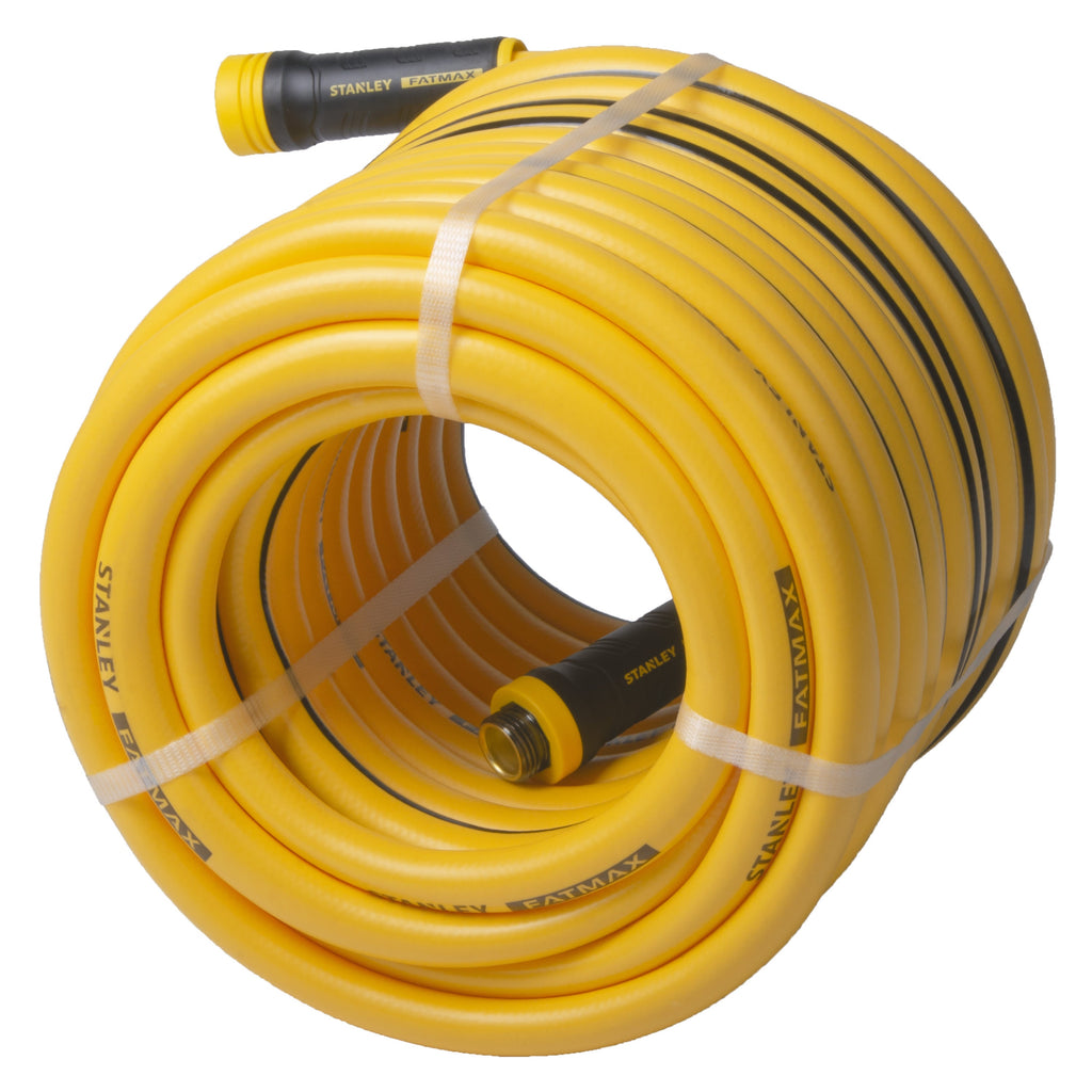 Coiled yellow garden hose with black stripes and a Stanley Fatmax label on a white background.