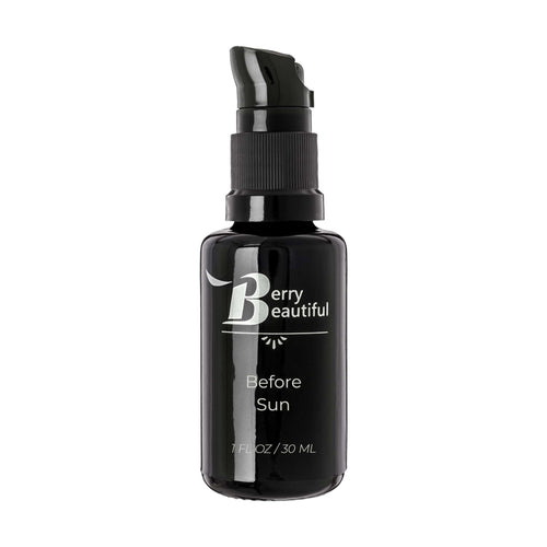 Black bottle of Berry Beautiful After Sun on a white background