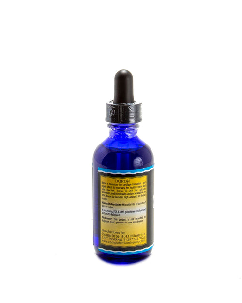 Blue glass dropper bottle with label on a white background