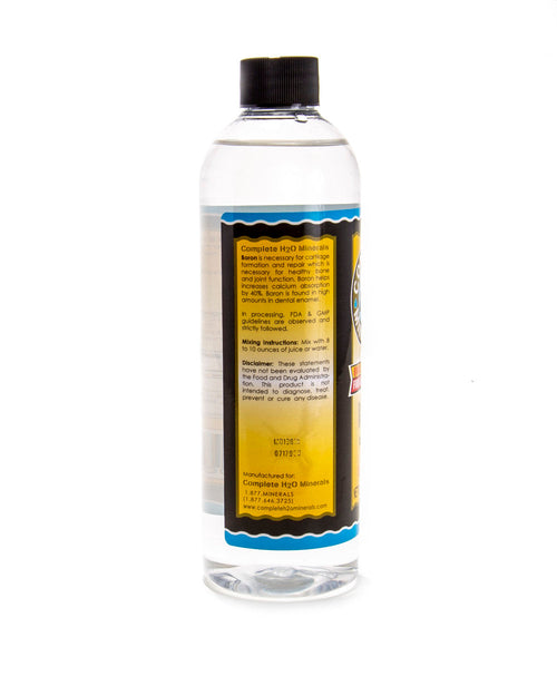 Clear bottle with a black cap and colorful label on a white background
