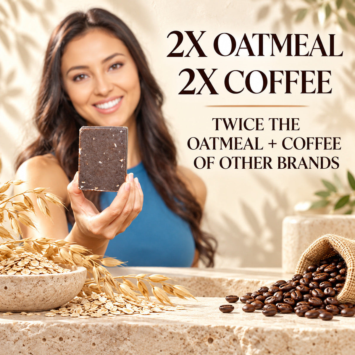 A smiling woman holds up a dark brown oatmeal coffee bar over a stone counter with oats, coffee beans, and decorative text reading '2X OATMEAL 2X COFFEE'.