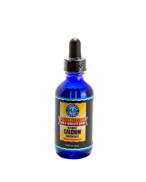 Blue bottle with a black dropper labeled 'Ultimate Calcium Concentrate' on a white background