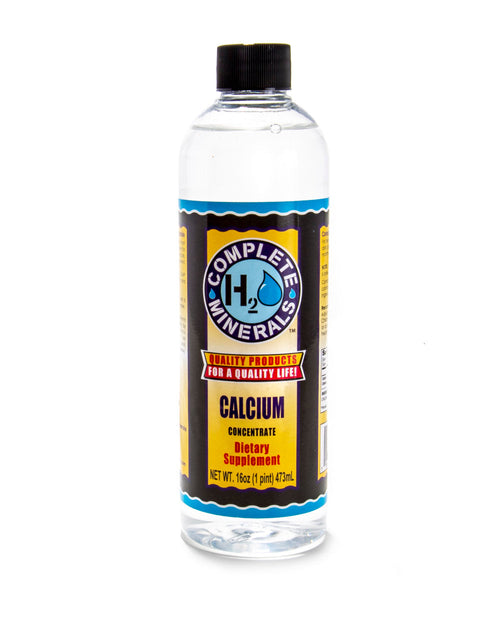 Bottle of Complete Minerals Calcium Concentrate dietary supplement on a white background