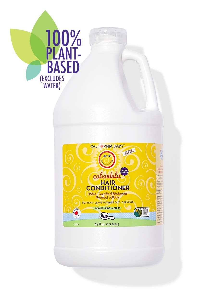 Gallon bottle of calendula hair conditioner with plant-based label on a white background. Calendula™ Hair Conditioner | Gentle Moisturizing Conditioner for Dry & Sensitive Hair (100% plant based ingredients, excludes water) 64 fl oz (1/2 gallon)