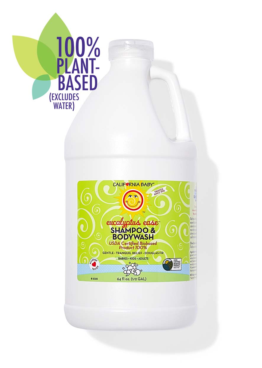 Gallon bottle of California Baby eucalyptus citrus shampoo and bodywash on a white background. USDA Certified Biobased Product 100% plant based. 64 fl oz 1/2 GAL