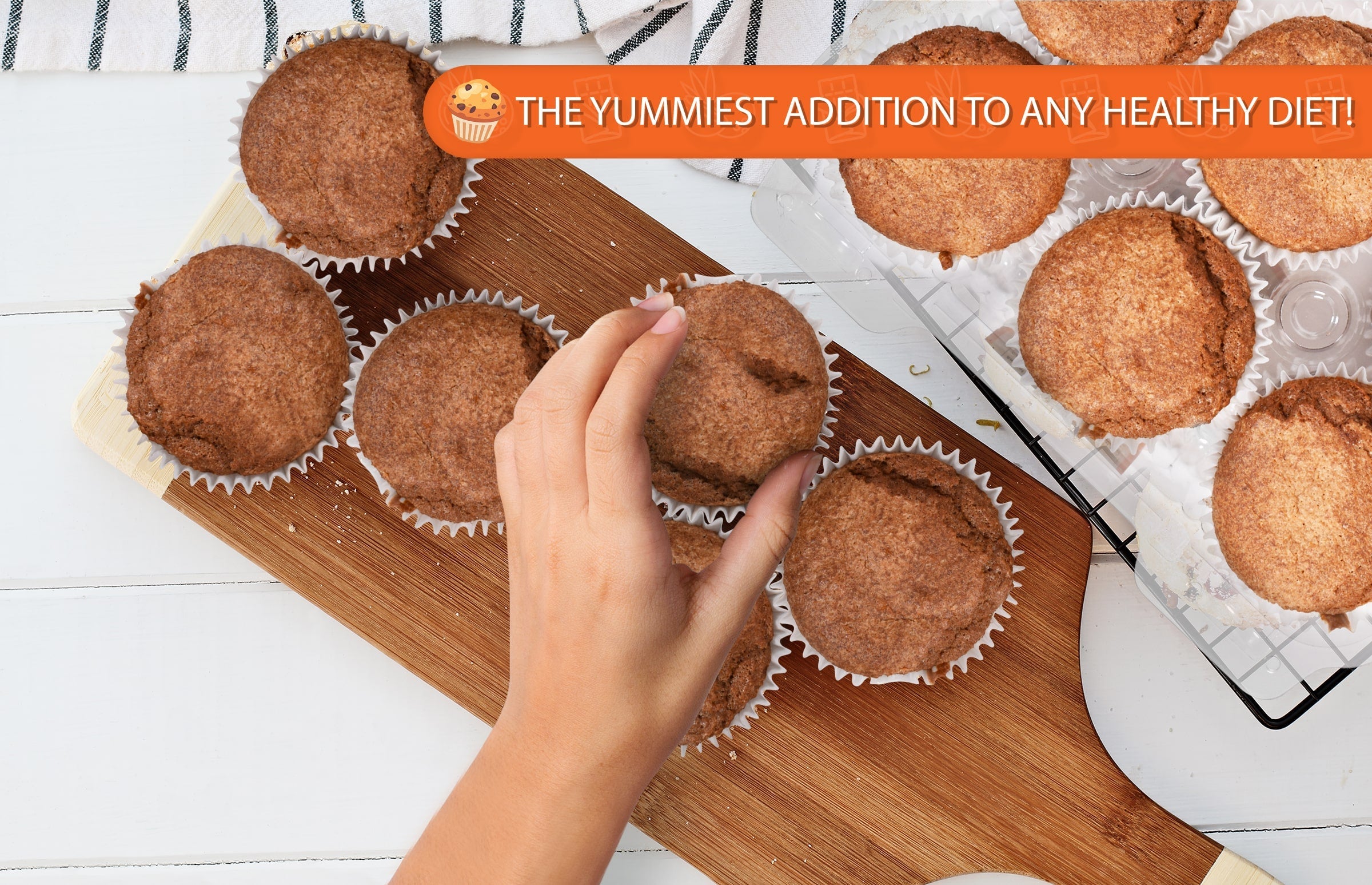 Hand reaching for a freshly baked cappuccino muffin on a wooden serving board surrounded by golden-brown muffins, with a banner reading "The Yummiest Addition to Any Healthy Diet!" Perfect for low-carb, sugar-free, keto-friendly breakfasts, coffee breaks, and wholesome bakery treats.