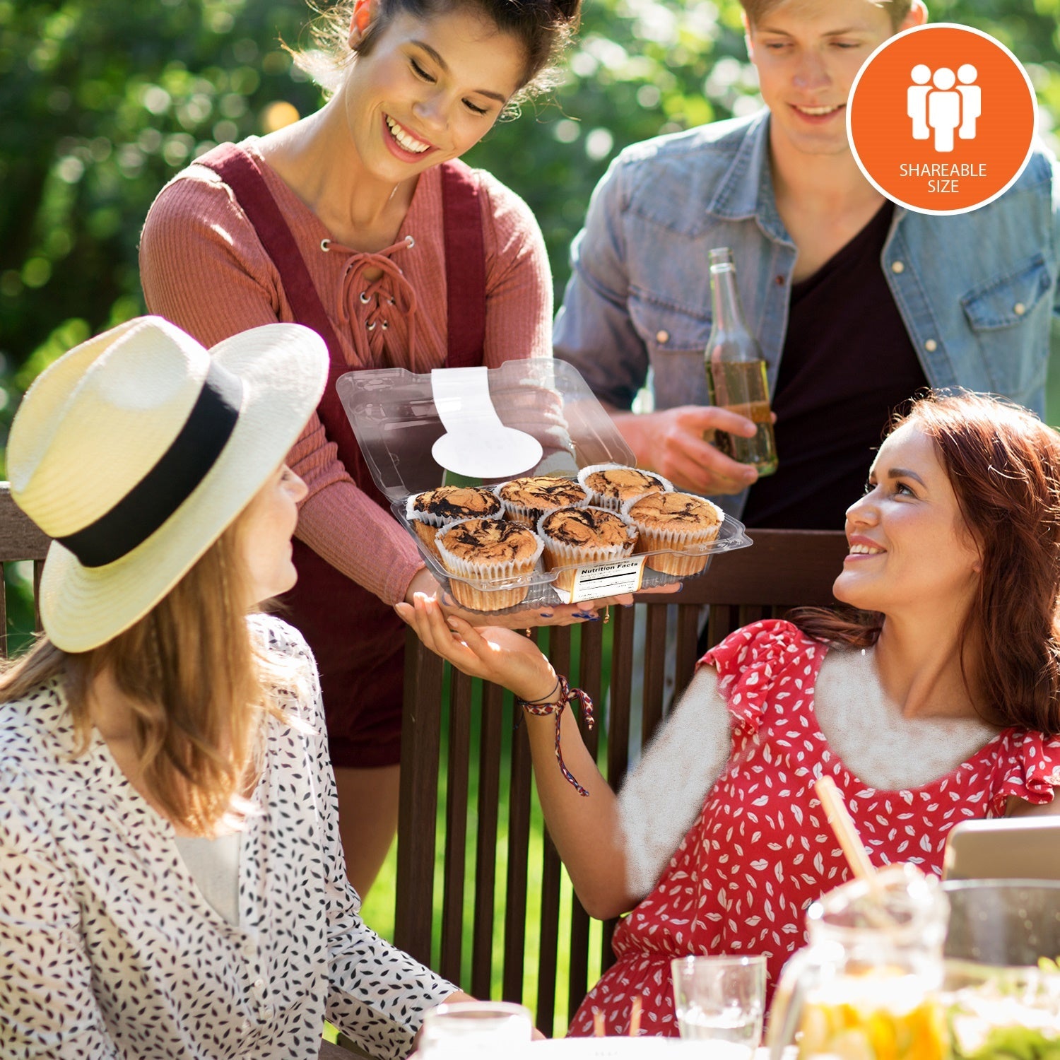 People enjoying fresh marble muffins together at a sunny outdoor gathering, highlighting low-carb, sugar-free bakery treats perfect for sharing, picnics, parties, and keto-friendly snacking.