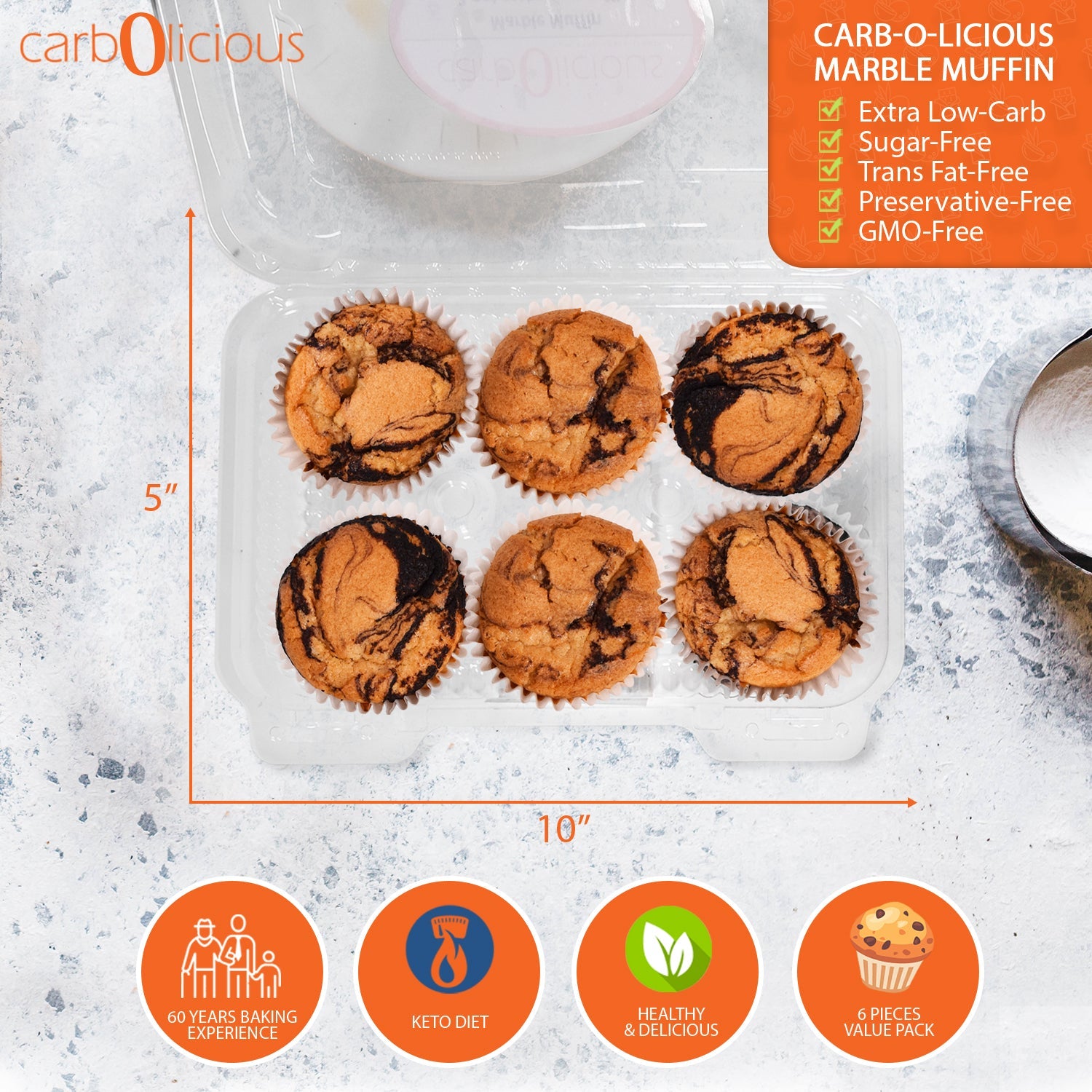 Carbolicious Marble Muffin Home-Style Low-Carb Sugar-Free 6-Pack in a clear bakery container, featuring six chocolate vanilla marble muffins. Product packaging highlights 3g net carbs per muffin, keto-friendly, sugar-free, trans fat-free, preservative-free, GMO-free, and healthy, delicious baking. Top-down product image on a light stone background.