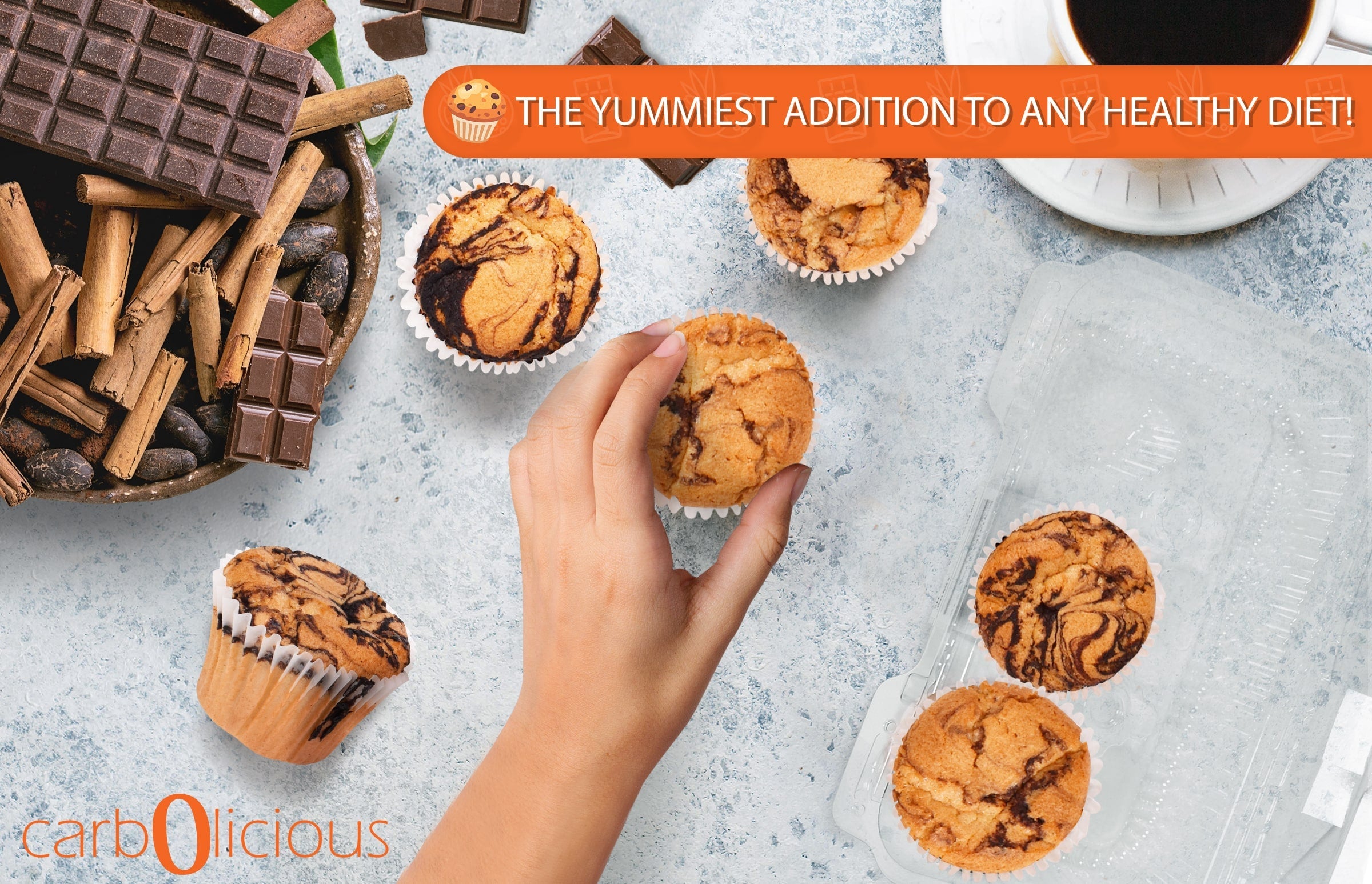 Freshly baked Carbolicious marble muffins with rich chocolate swirls on a light stone surface, surrounded by chocolate bars, cocoa beans, cinnamon sticks, and a cup of coffee. A hand reaches for a muffin beside an open bakery container, with a banner reading, “The Yummiest Addition to Any Healthy Diet!” Perfect for illustrating low-carb, sugar-free, keto-friendly bakery treats.