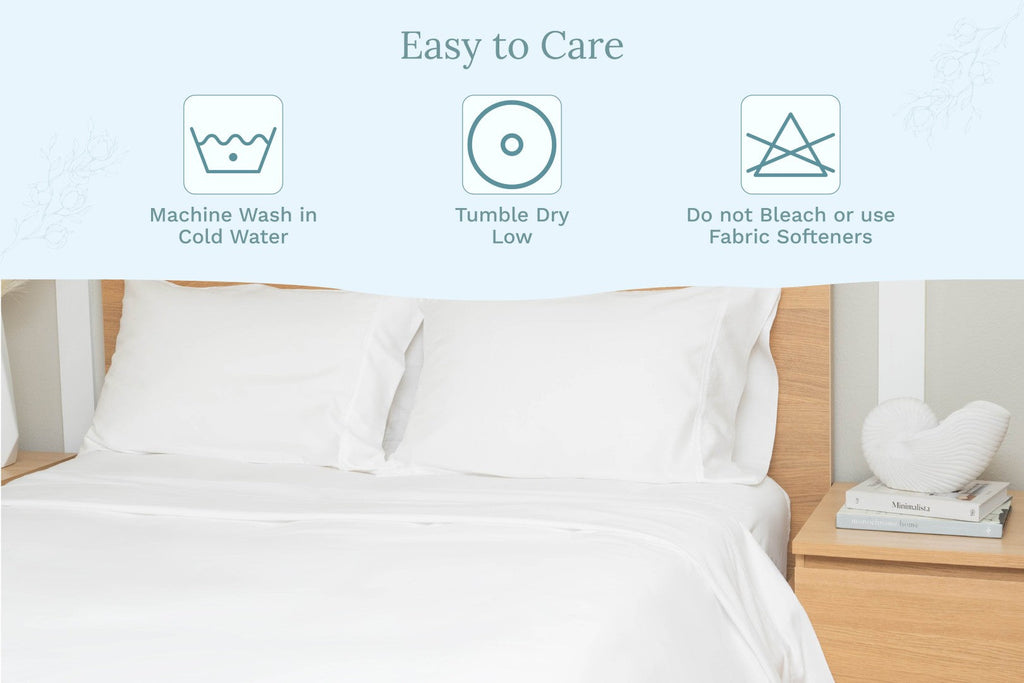 Bed with white bedding and pillows, featuring washing instructions on a light blue background. Organic Sateen Bed Sheets Set