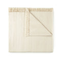 Beige textured blanket on a white background. Organic Cotton Throw with Tassels