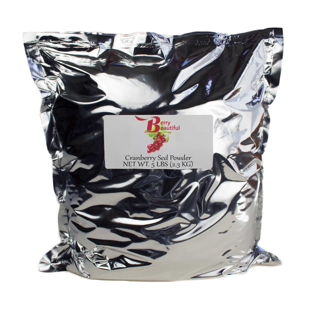 Silver bag of cranberry seed powder with a label on a white background