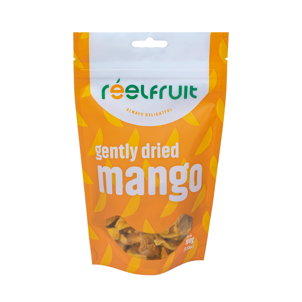 Packaged dried mangoes with 'réelfruit' branding on an orange background