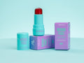 Mermaid Pearls LOLLIPOP Berry Lip & Cheek Tint in aqua tube with purple box packaging, hydrating jelly blush and lip color for a natural rosy glow, vegan cruelty-free clean beauty makeup.