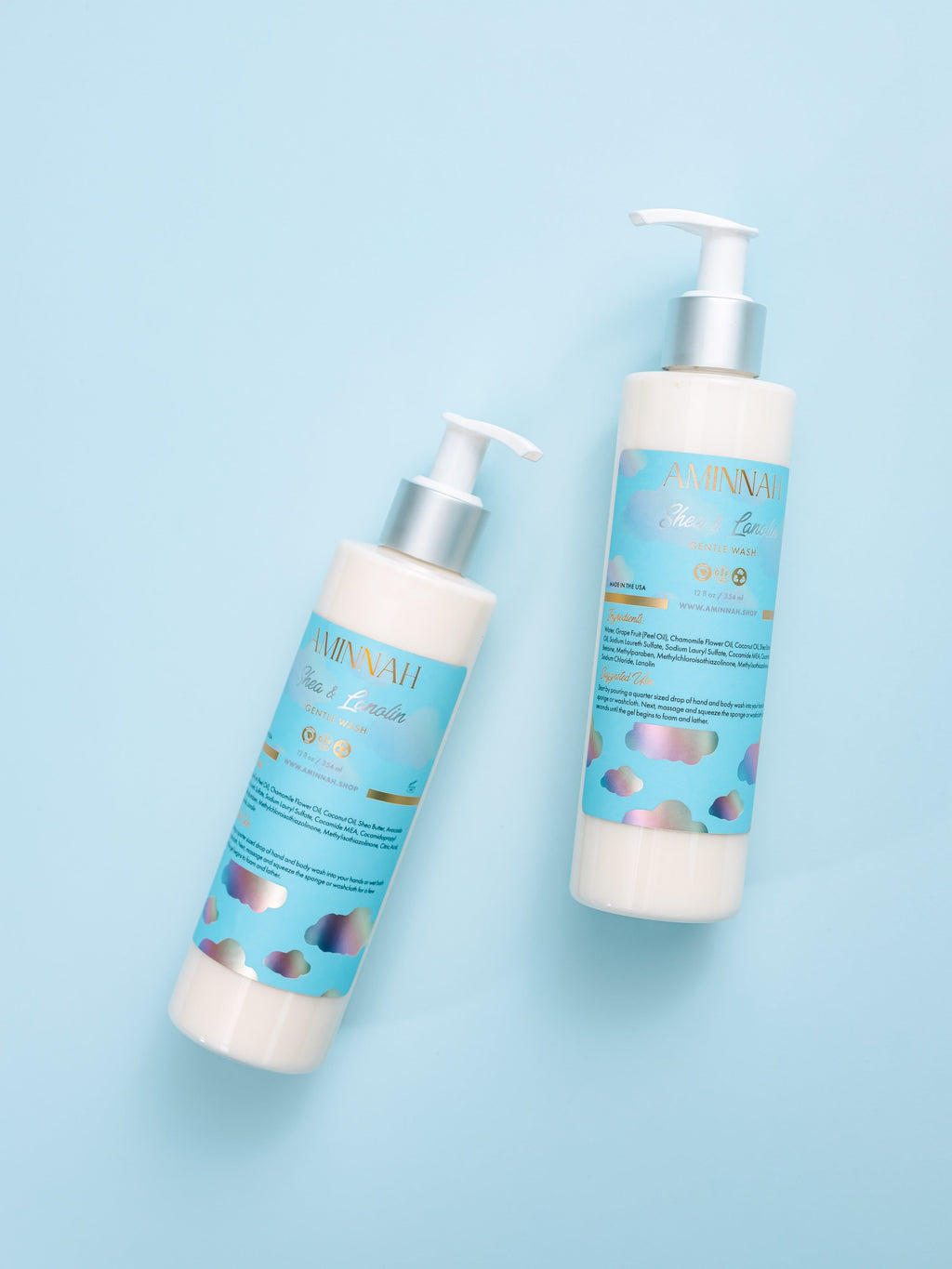 Two bottles of shampoo with blue labels on a light blue background. Eczema (Shea & Lanolin) Gentle Cleanser. Clean Beauty Commitment, Clean beauty inspired
Made with skin-loving ingredients, Cruelty-free, Female-owned brand