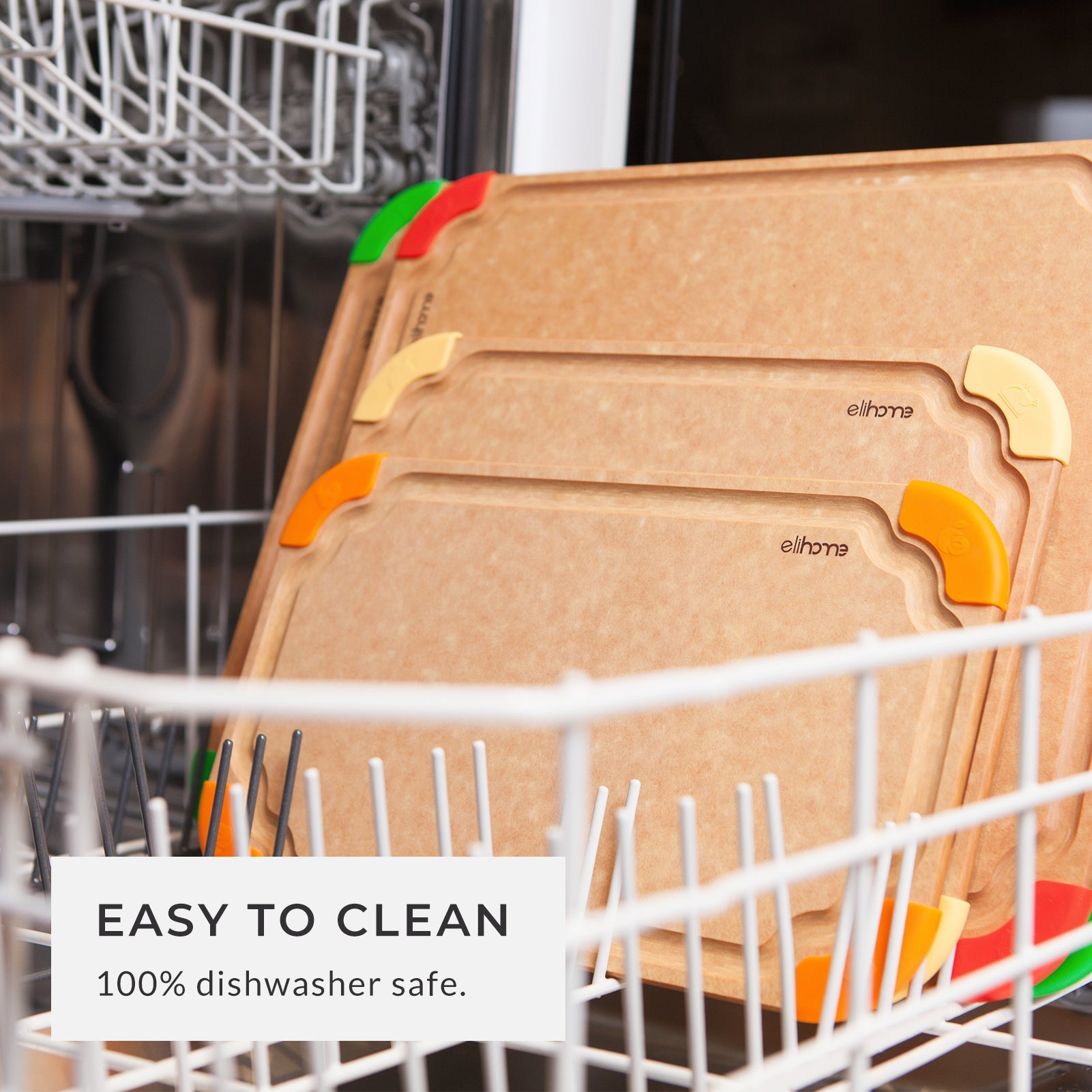 Set of premium color-coded cutting boards standing inside a dishwasher, highlighting their 100% dishwasher-safe design for easy cleaning, everyday kitchen use, and long-lasting durability.