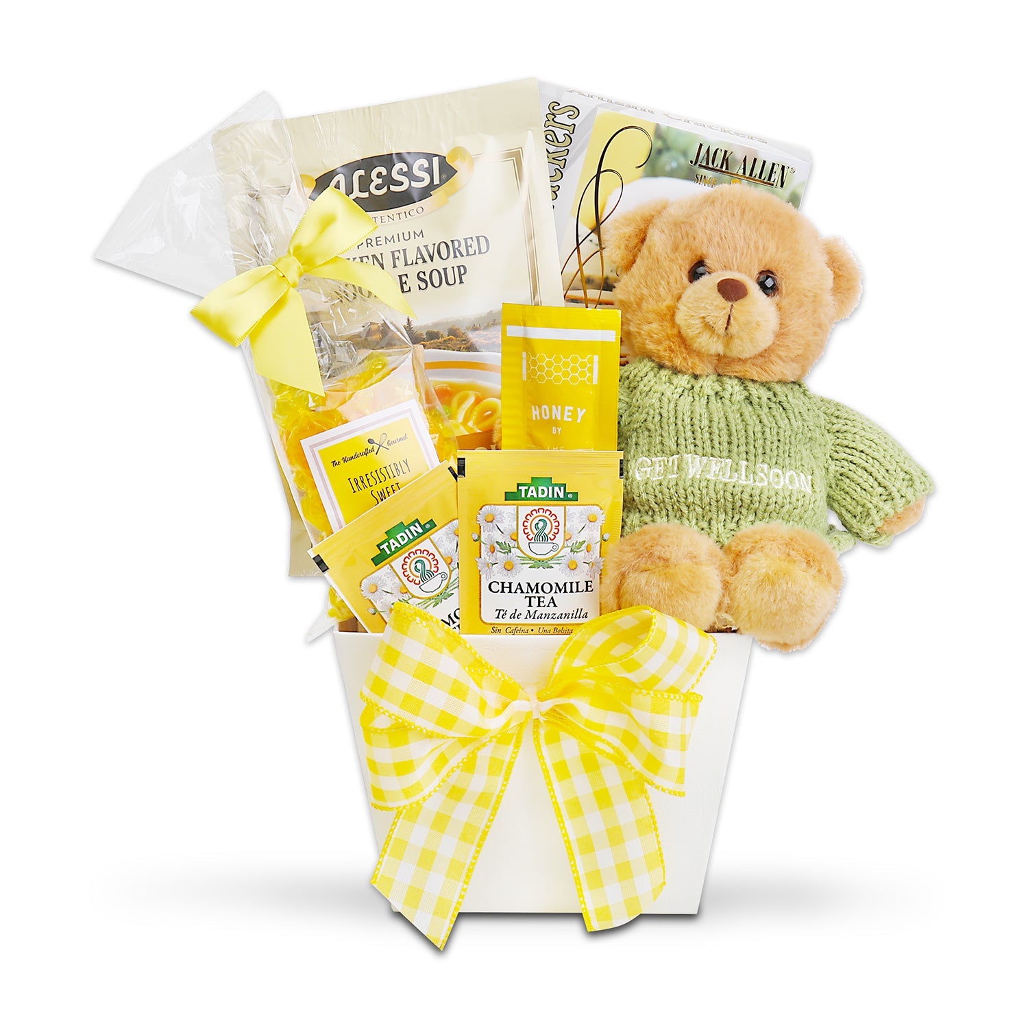 Gift basket with a teddy bear, tea packages, and snacks on a white background. Hugs & Well Wishes Gift Basket: Alessi Premium Chicken Flavored Noodle Soup, Artisan Olive Oil & Sea Salt Crackers, Butterscotch Candy, Chamomile Tea, 2 Honey Sticks, Plush Teddy Bear with “Get Well Soon” Sweater