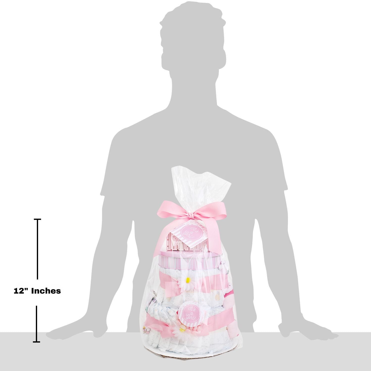 Silhouette of a person wearing a baby shower gift bag with measurements indicated. Sweet Baby Girl Diaper Cake Gift: 28 Huggies Diapers, Baby's First Tooth Box, Baby's First Curl Box, Layette Set, Hand & Foot Plaster Mold Kit.