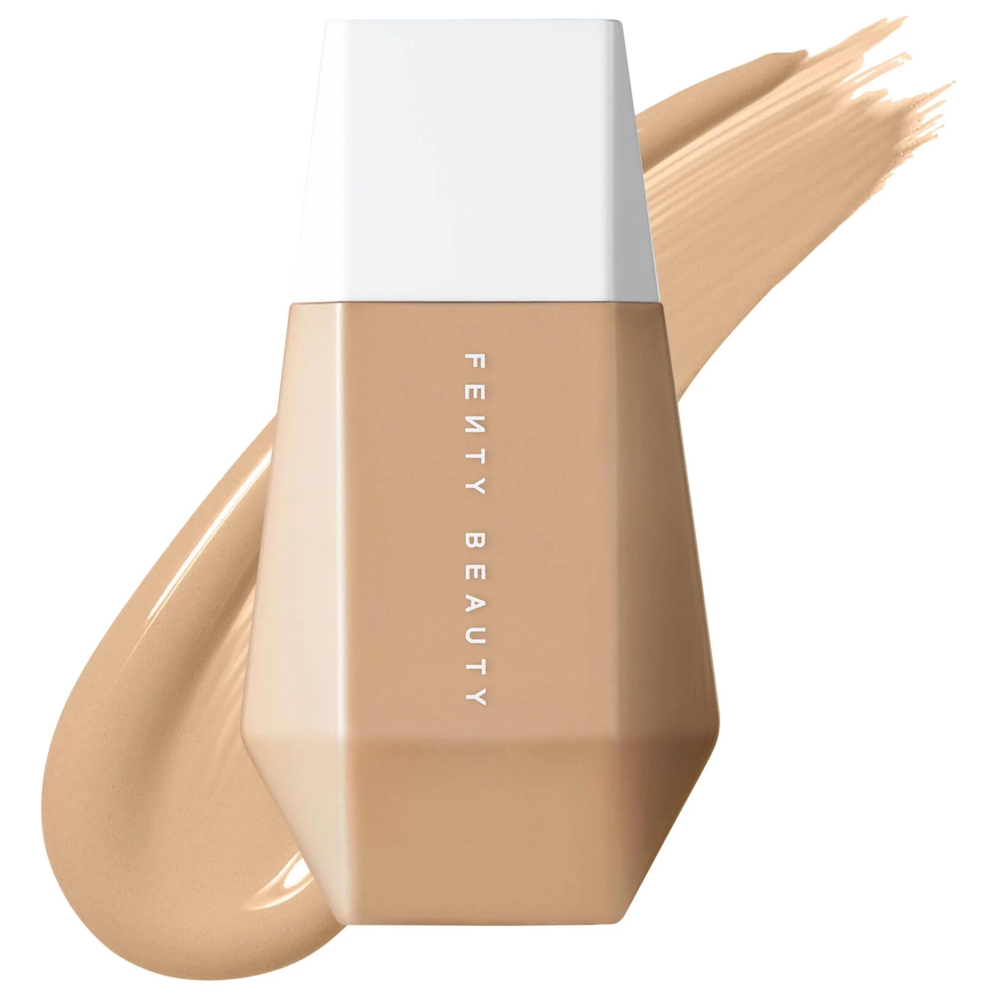 Fenty Beauty Eaze Drop Blurring Skin Tint foundation bottle with a beige foundation swatch on a white background.