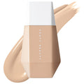 Fenty Beauty foundation bottle with beige color swatch on a white background. Fenty Beauty Eaze Drop: Blurring Skin Tint - Lightweight, Natural Finish, Light Coverage Foundation for Radiant Skin