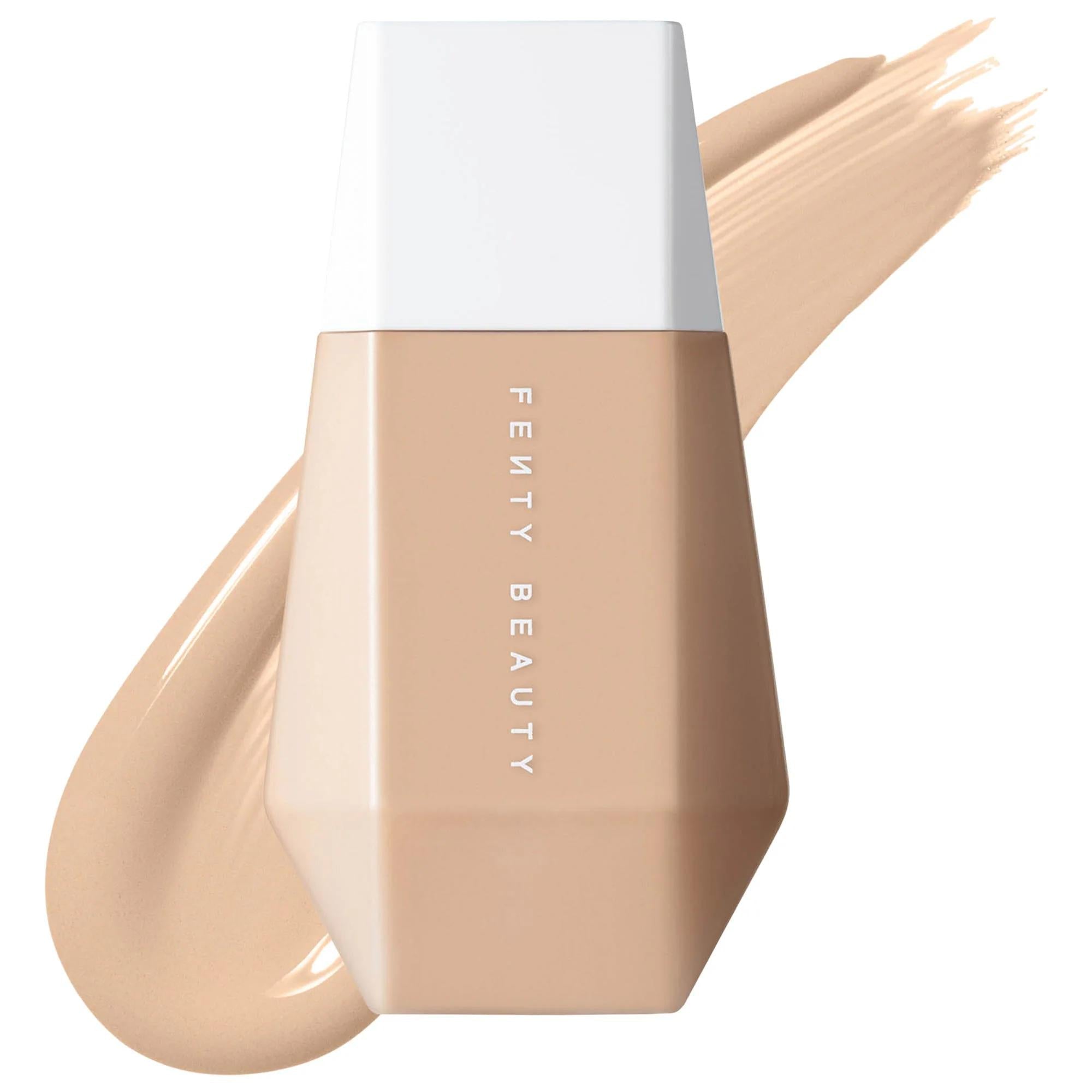 Fenty Beauty foundation bottle with beige color swatch on a white background. Fenty Beauty Eaze Drop: Blurring Skin Tint - Lightweight, Natural Finish, Light Coverage Foundation for Radiant Skin