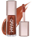 Lip gloss with applicator and visible brand name on a white background. Fenty Beauty Gloss Bomb Cream: Creamy Color Drip Lip Cream - Shiny, Non-Sticky, Full Coverage, Peach Vanilla Lip Gloss & Vitamin A for Nourished Lips