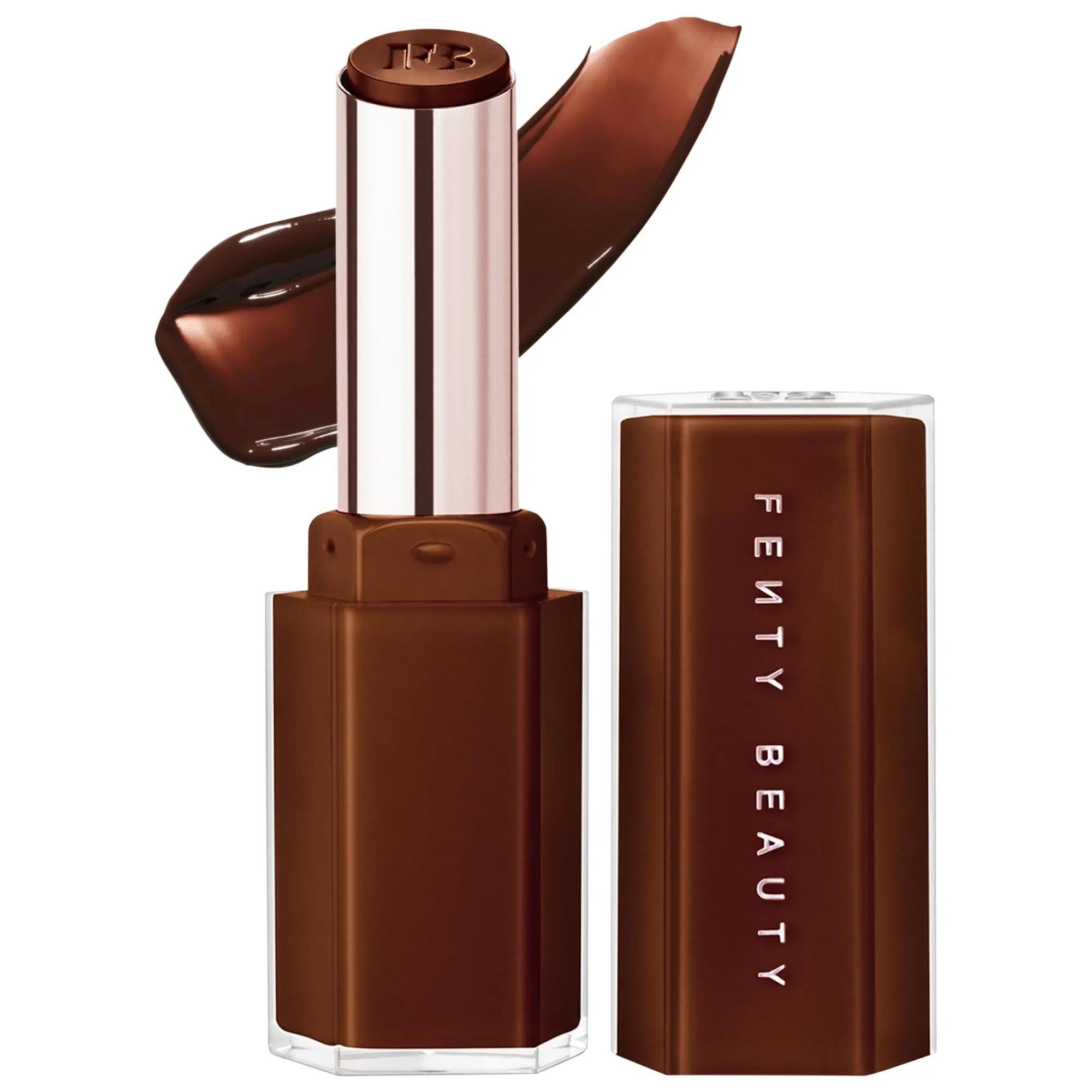 Fenty Beauty Gloss Bomb Stix High-Shine gloss stick with cap removed and brown shade swatch on a white background