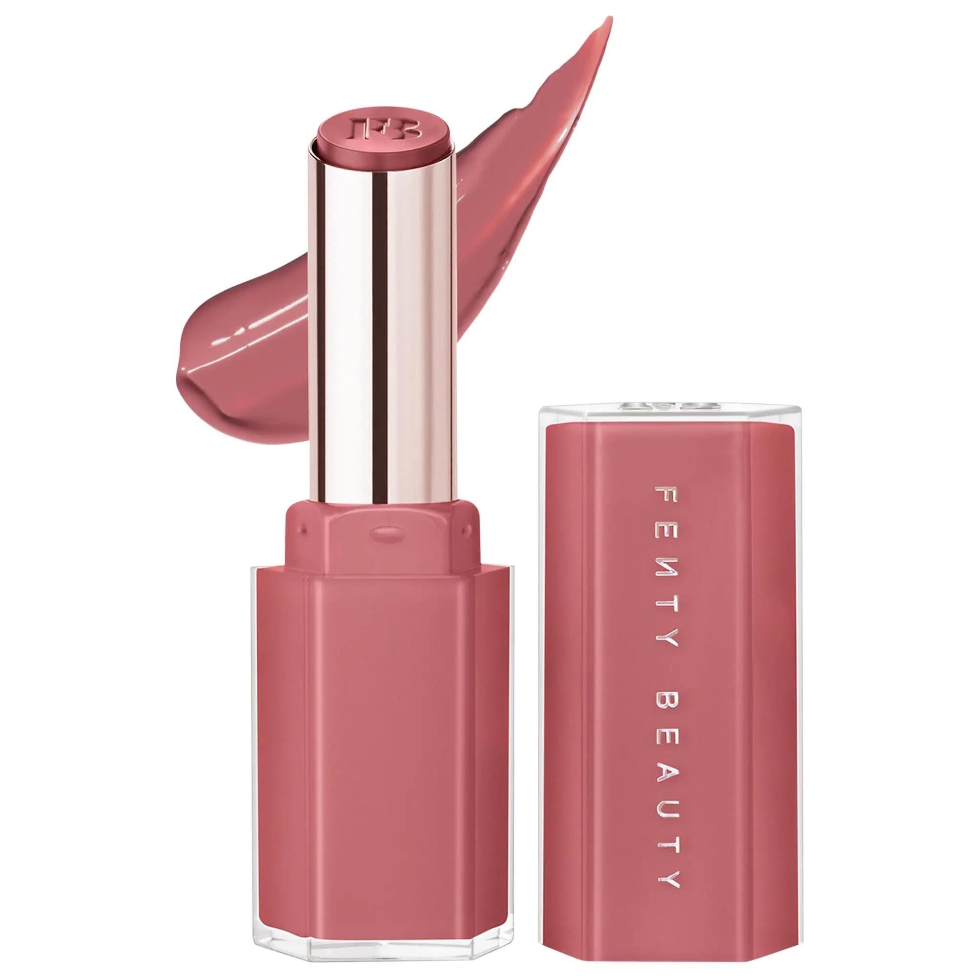 Fenty Beauty Gloss Bomb Stix High-Shine Lip Gloss & Lipstick in dusty rose nude with a glossy cream swatch, hydrating vegan lipstick and lip gloss hybrid in sleek pink packaging.