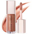 Fenty Beauty lip gloss with applicator on a white background. Fenty Beauty Gloss Bomb: Universal Lip Luminizer - High Shine, Non-Sticky, Moisturizing Lip Gloss for All Skin Tones