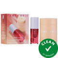 Fenty Skin Perfect Puckin Hydrating Lip Care Duo set, featuring the pink and peach-colored product box, a red and white lip treatment tube, and a beige puck container, with a green 'Clean at Sephora' badge overlay on a white background. Clean Beauty