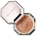 Fenty Beauty Pro Filt'r Setting Powder with open hexagonal compact and loose powder on a white background.