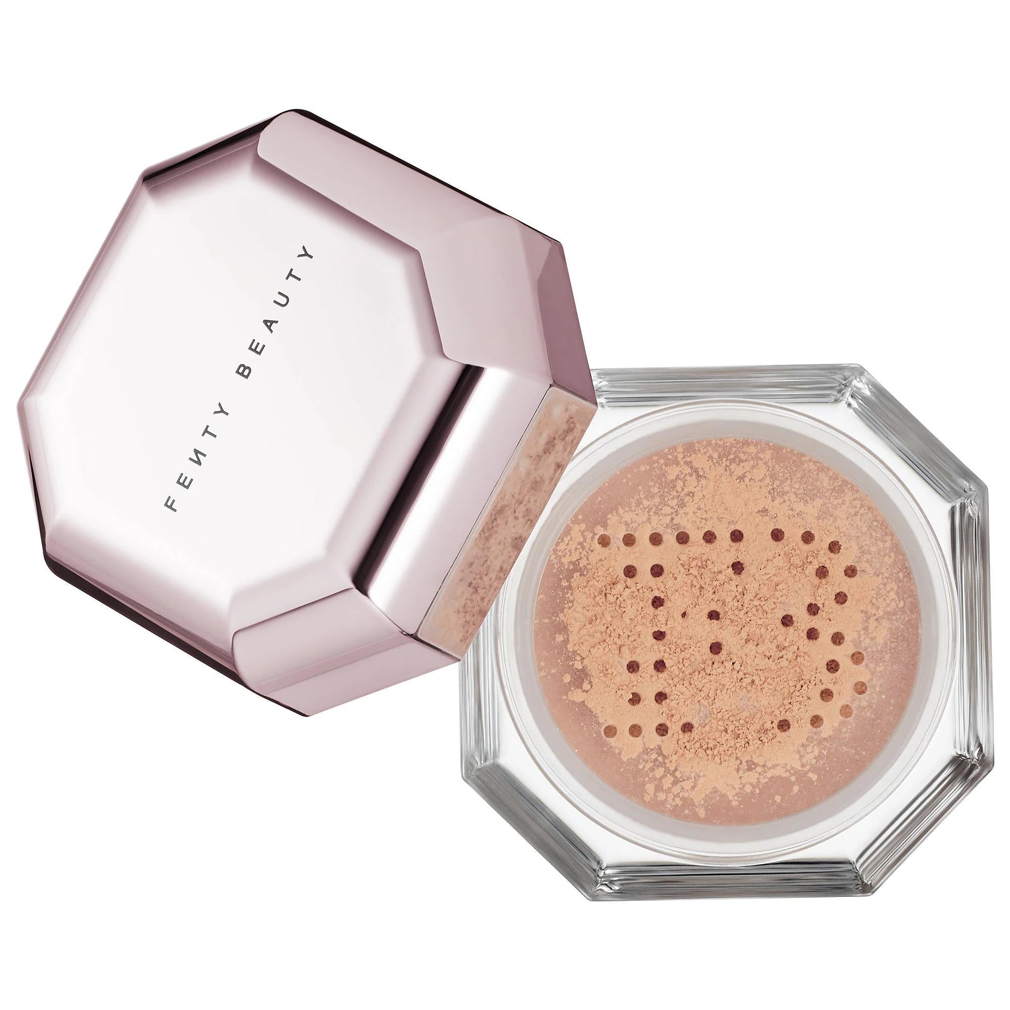 Fenty Beauty Pro Filt'r Setting Powder loose powder with open hexagonal compact and lid on a white background