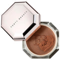 Fenty Beauty Pressed Powder Foundation in a hexagonal clear jar with a metallic rose gold lid, shown open with the lid resting beside the compact on a white background. Fenty Beauty Pro Filt'r: Weightless Loose Setting Powder for Shine Control & Photo-Ready Perfection - Cruelty-Free