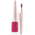 Fenty Beauty Stunna Lip Paint liquid lipstick in a vibrant berry pink shade with a soft matte finish, shown with the applicator wand beside the sleek geometric tube on a white background.