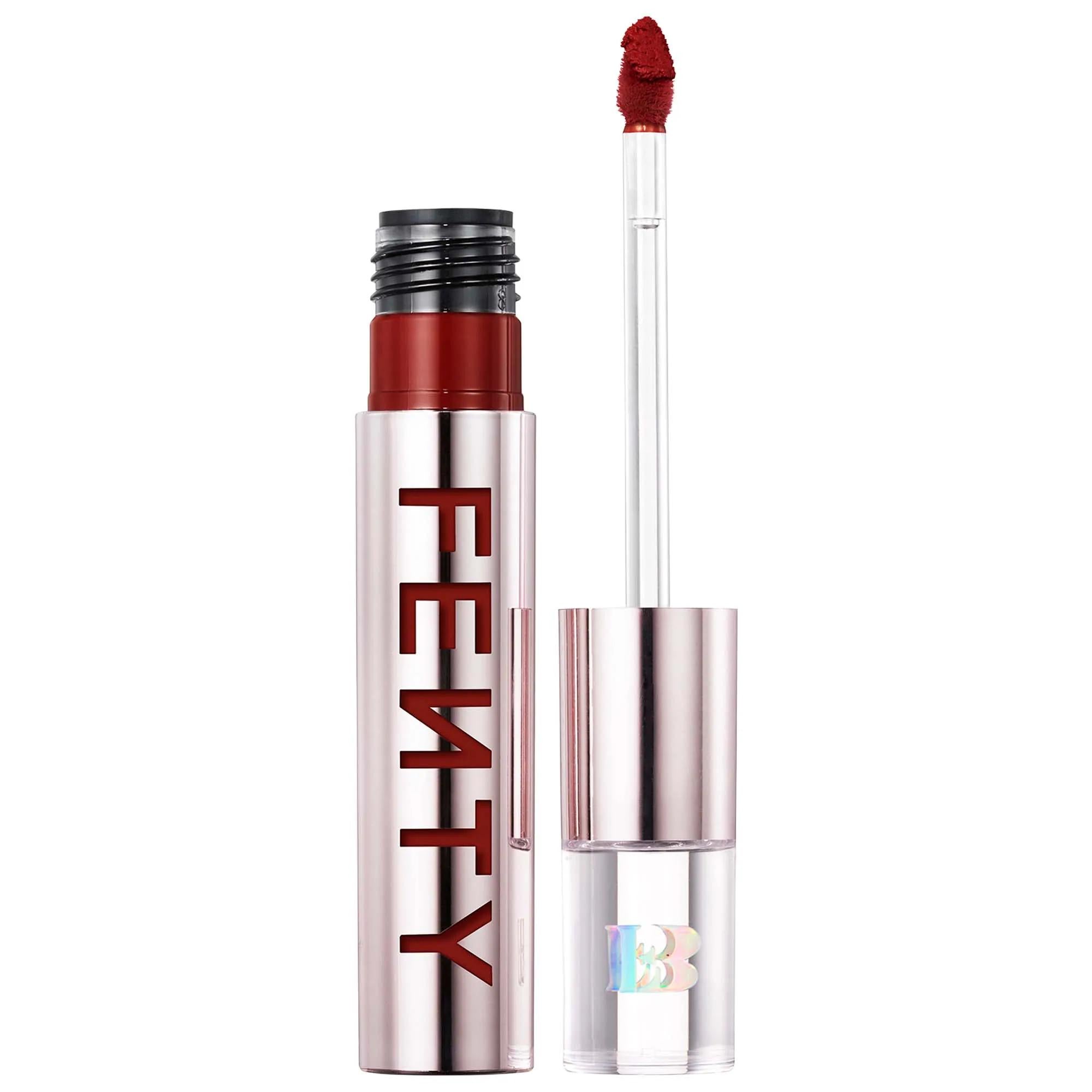 Fenty Beauty Icon Velvet Liquid Lipstick with doe-foot applicator in rich warm brown shade, shown open beside reflective silver tube on a white background.