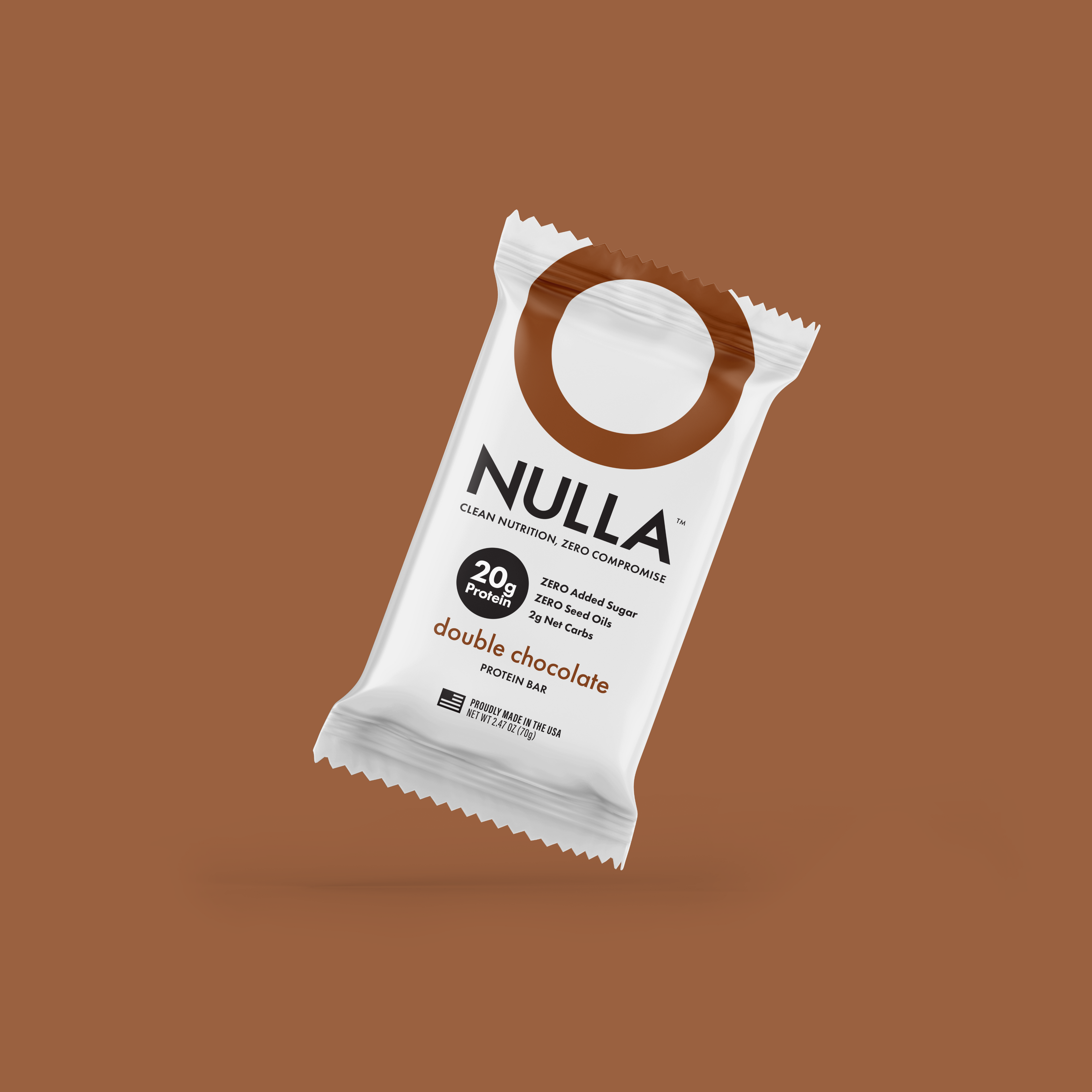 NULLA double chocolate protein bar packaging on a brown background