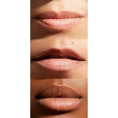 Close-up of lips with different shades of brown on a white background