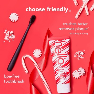 hello Holiday Home for the Holidays toothpaste and BPA-free toothbrush oral care travel set with festive candy cane design, tartar-removing toothpaste and travel hygiene essentials