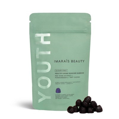 A mint green stand-up pouch of Imara's Beauty Youth Healthy-Aging Skincare Gummies, shown with several dark purple gummies in front on a white background.
