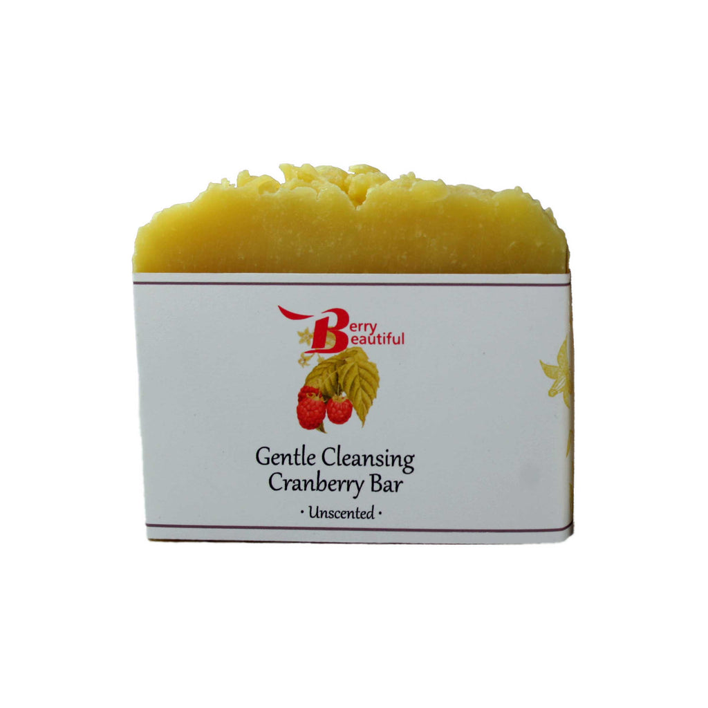 Yellow cleansing bar with a white label featuring 'Berry Beautiful' branding on a white background