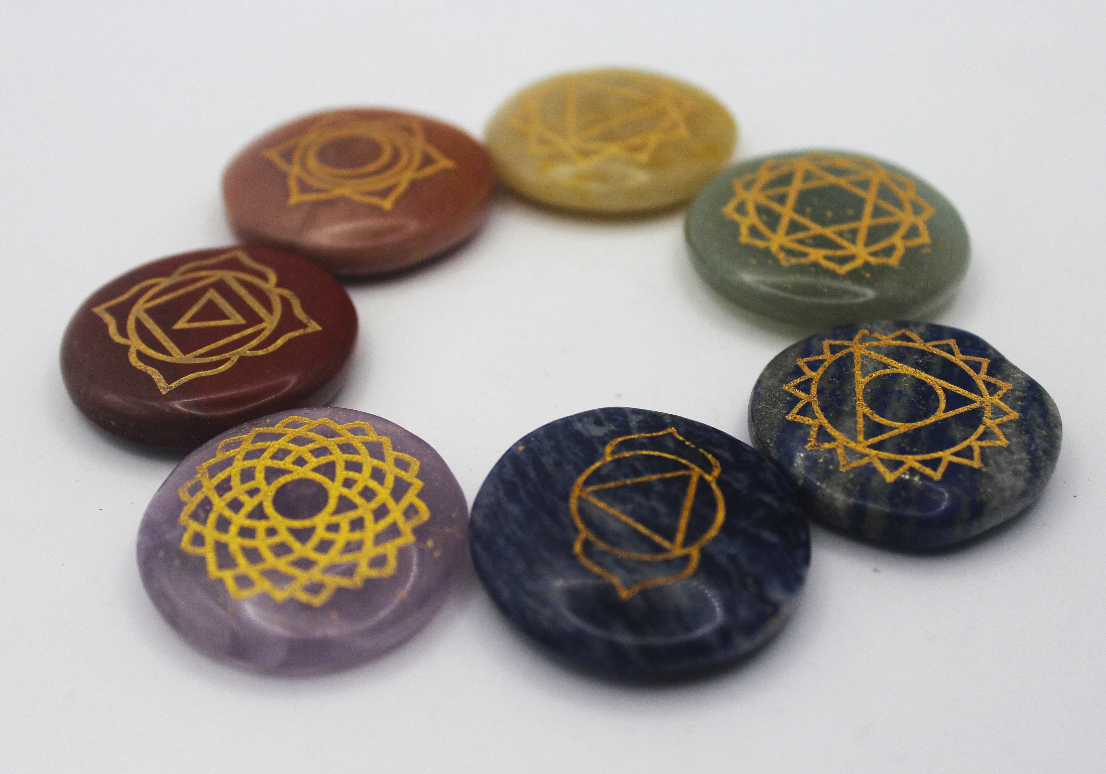 Seven Stone Chakra Set – Engraved Gold Symbols for Balance & Alignment