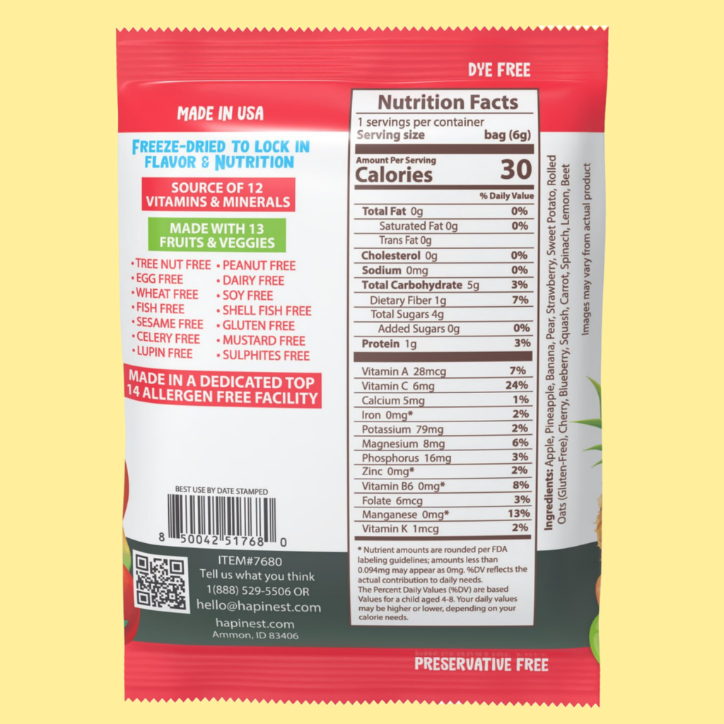 Back of a freeze-dried fruit and vegetable snack packet showing nutrition facts, ingredients, and allergen information on a pale yellow background. Tree Nut-Free, Peanut-Free, Egg-Free, Dairy-Free, Wheat-Free, Fish-Free, Sesame-Free, Celery-Free, Lupin-Free, Soy-Free, Shell-Fish Free, Gluten-Free, Mustard-Free, Sulphites-Free. Made with 13 fruits and veggies, source of 12 vitamins and minerals. Made in a dedicated top 14 allergen free facility.