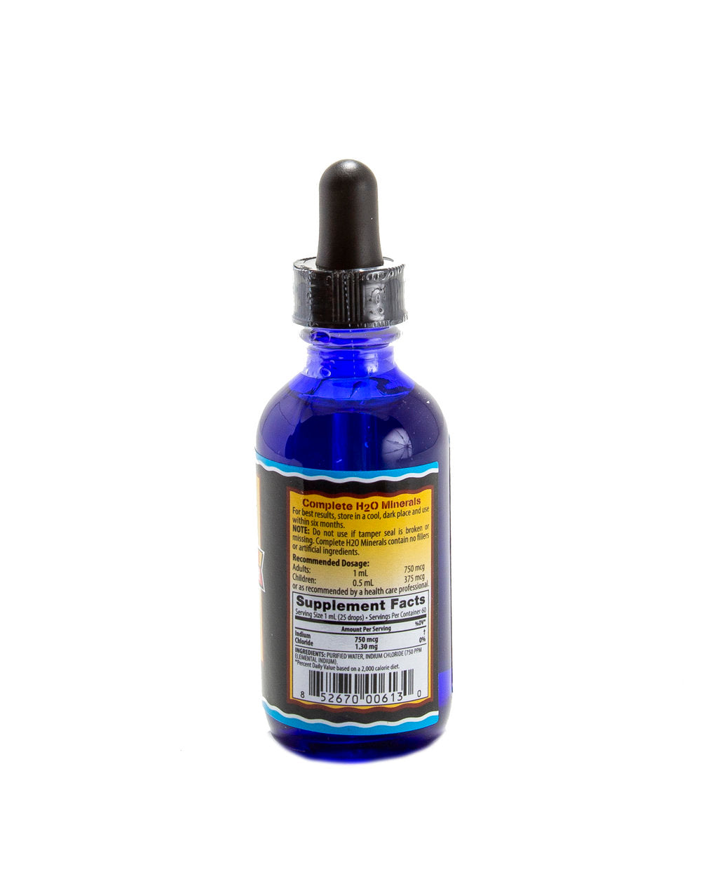 Blue glass bottle with dropper on a white background