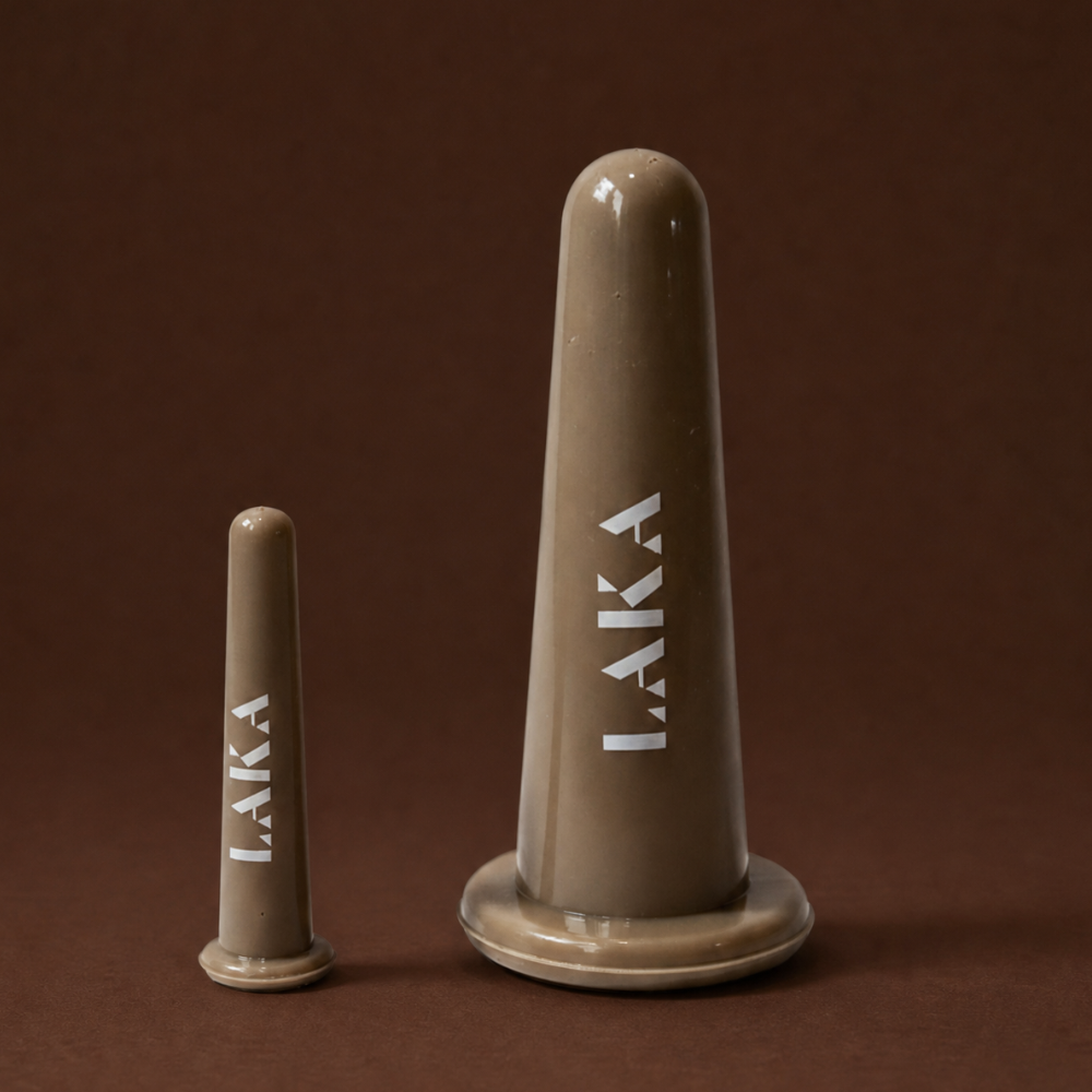 Two brown ceramic cones with 'LAKA' branding on a brown background. LAKA® Face Cups