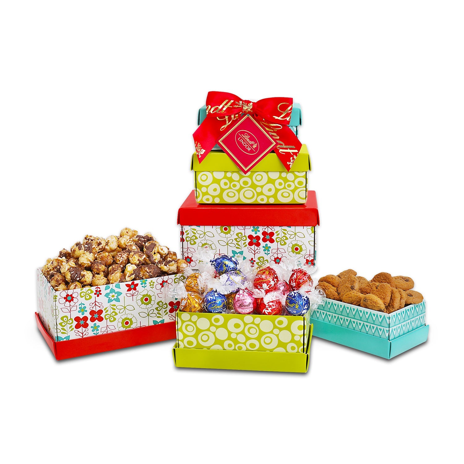 Colorful gift box set with various treats on a white background
