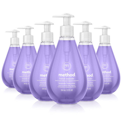 Multiple bottles of Method French Lavender hand soap on a white background