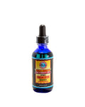 Bottle of magnesium supplement with dropper on a white background